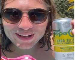 Sam Brooks consuming alcohol